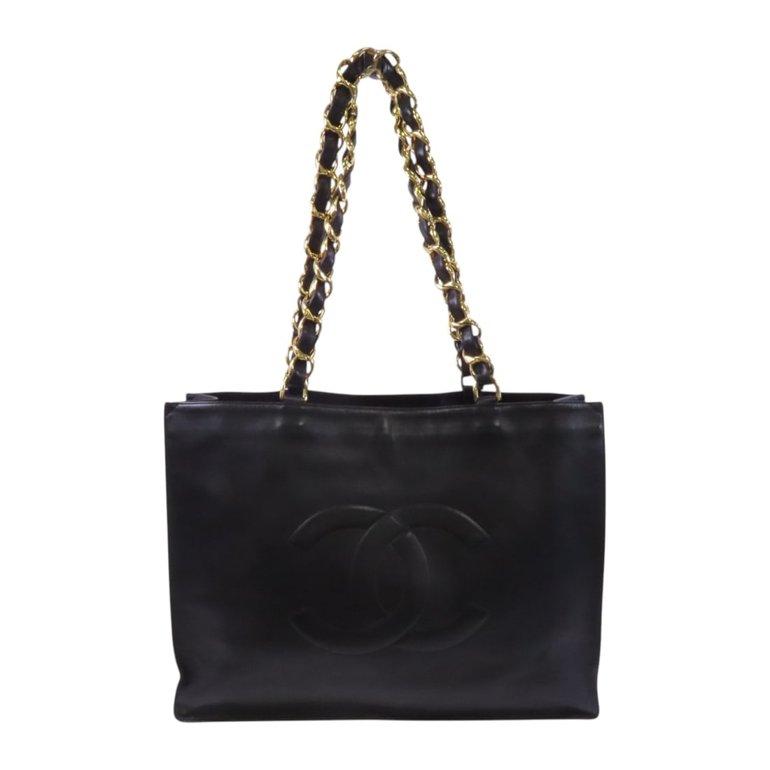 CHANEL Black Lambskin Leather Tote Bag with GHW: CHANEL Black Lambskin Leather Tote Bag with GHW This elegant CHANEL shoulder tote bag is crafted from luxurious black lambskin leather, known for its softness and durability. With a generous size of 1