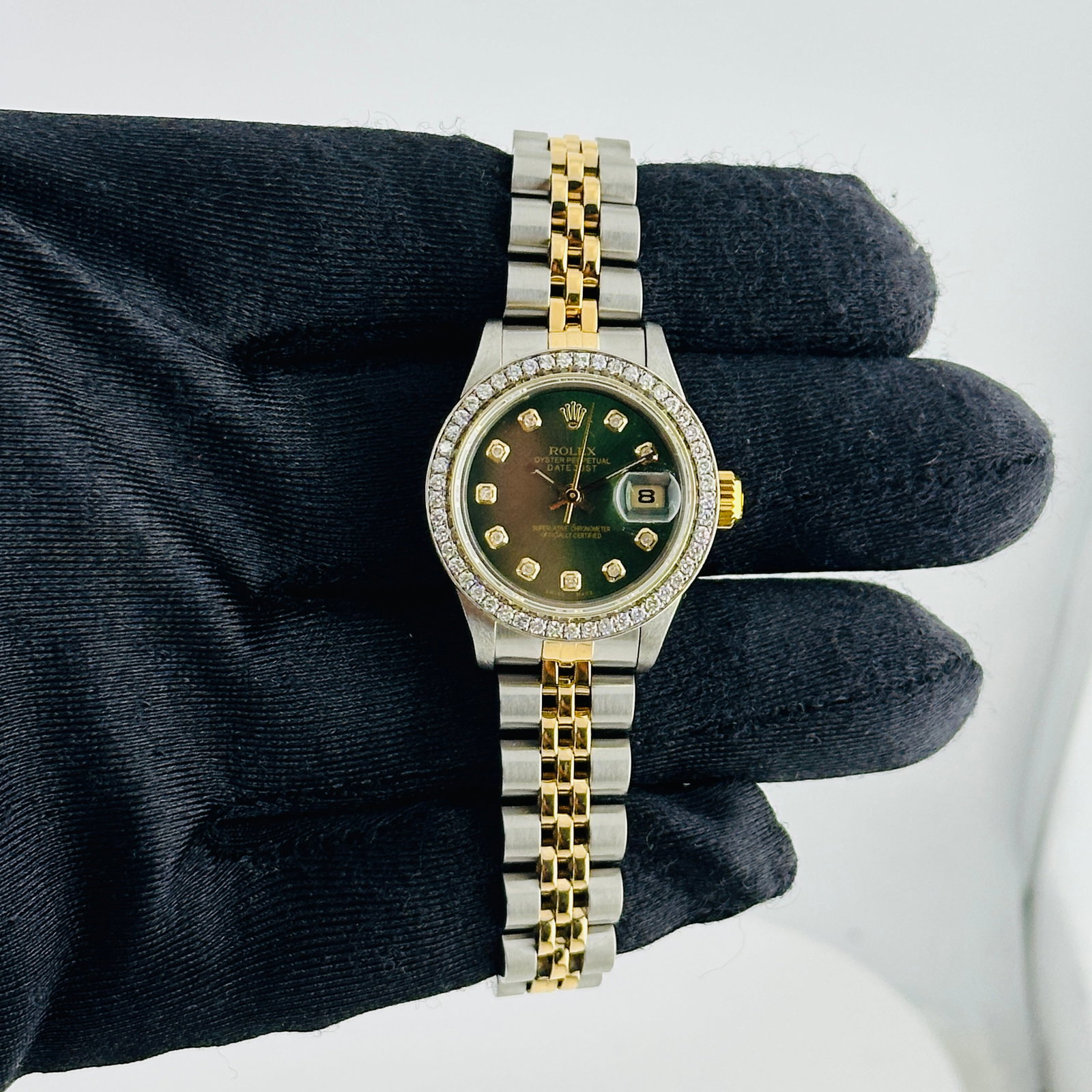 Ladies Datejust Ref 69163 Aftermarket Pink Diamond Dial D-Link Jubilee: Ladies Datejust Ref 69163 Aftermarket Pink Diamond Dial D-Link Jubilee This ladies Rolex Datejust features an aftermarket pink diamond dial and a D-Link Jubilee bracelet. The bezel is set with pave 10