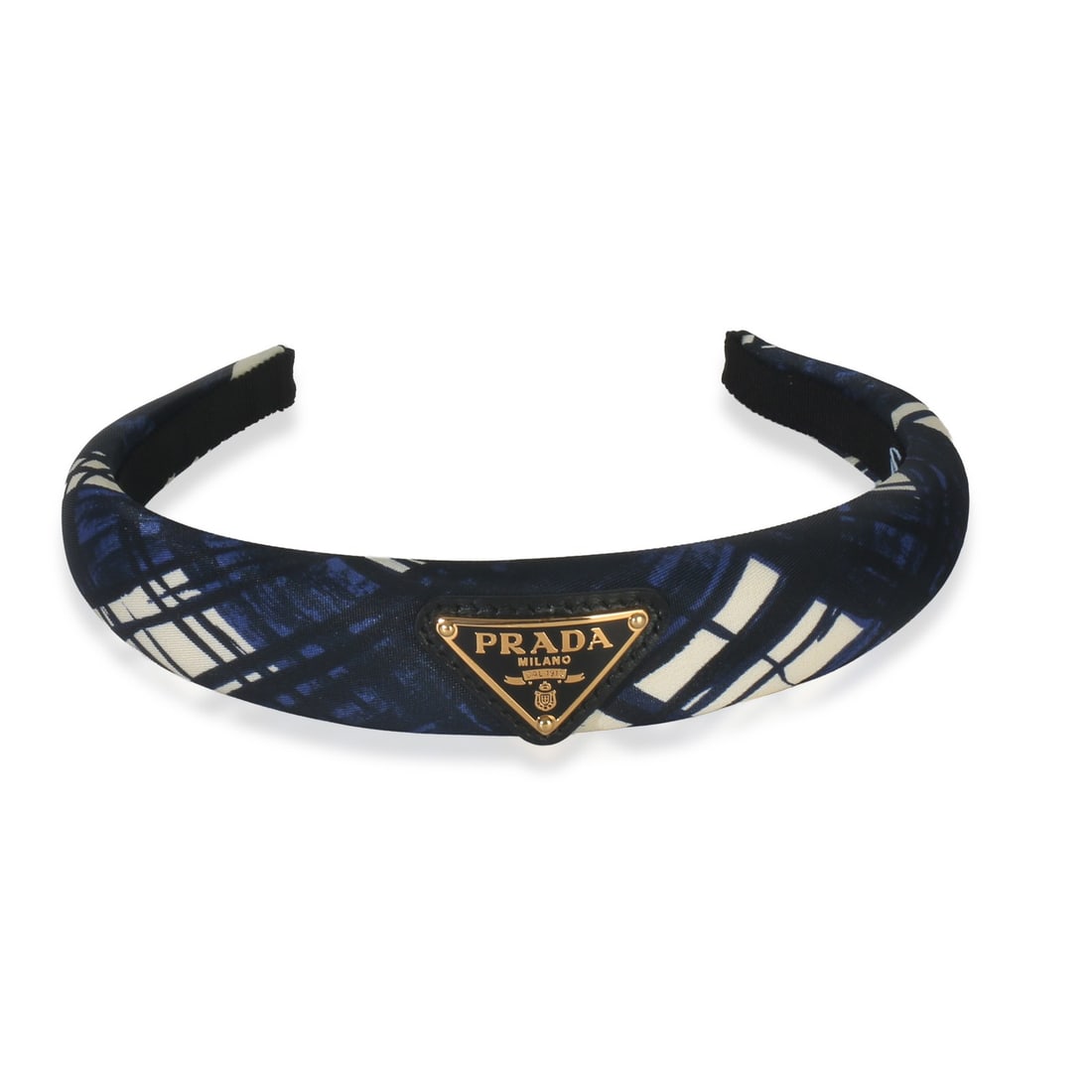 Prada Blue Re-Nylon Logo Headband with Box and Accessories: Prada Blue Re-Nylon Logo Headband with Box and Accessories This Prada navy printed Re-Nylon logo headband is crafted from fabric with a blue exterior and blue nylon lining. Featuring an open top desig