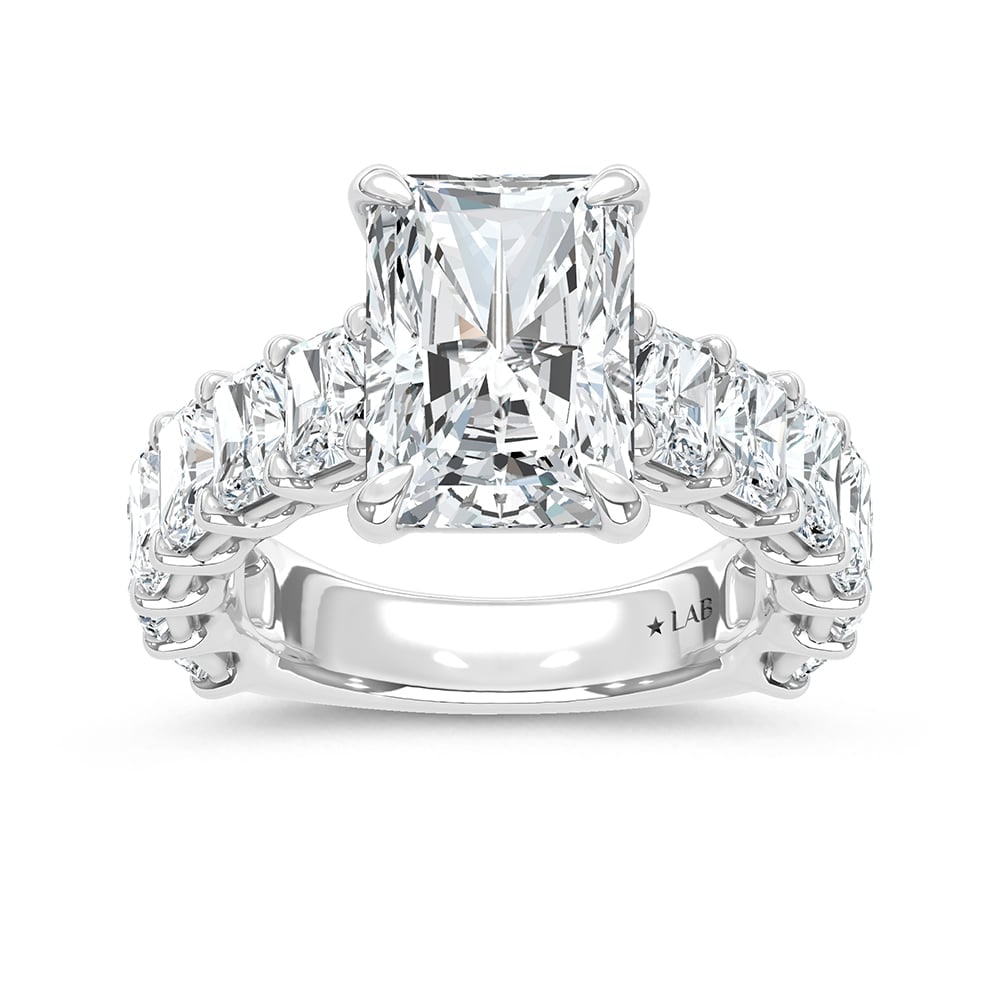 14K White Gold Lab Grown Diamond 8 5/8 Ct.Tw. Elongated Radiant Shape Engagement Ring (Center 5Ct ): 14K White Gold Lab Grown Diamond 8 5/8 Ct.Tw. Elongated Radiant Shape Engagement Ring (Center 5Ct ) This elegant diamond engagement ring crafted in 14k White gold, features a Radiant -cut center stone