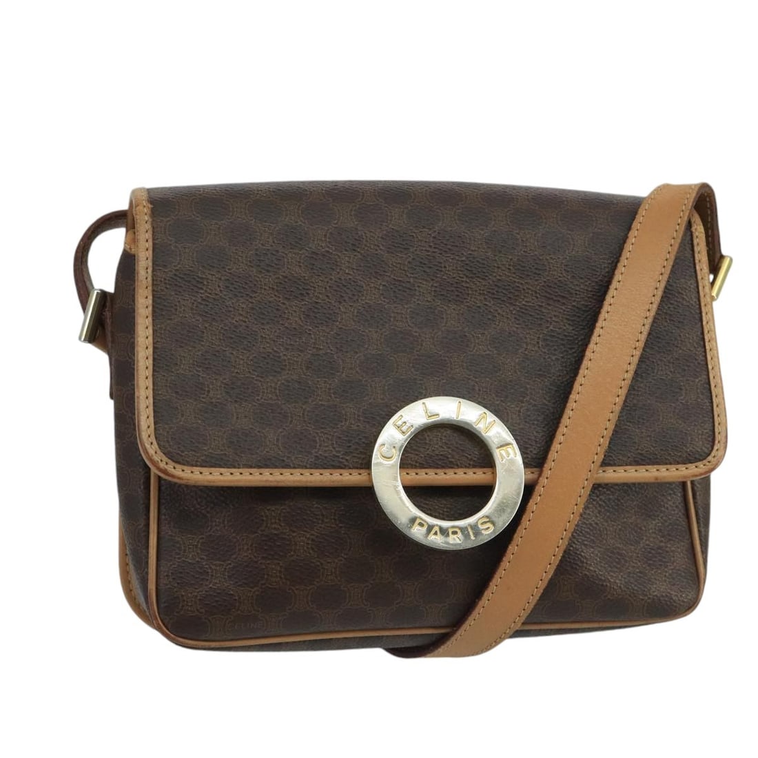 Celine Macadam Circle Logo Brown Canvas Leather Vintage Shoulder Bag: Celine Macadam Circle Logo Brown Canvas Leather Vintage Shoulder Bag This Celine Vintage Macadam Circle Logo Shoulder Bag features a classic brown canvas exterior with leather accents and a prominent 