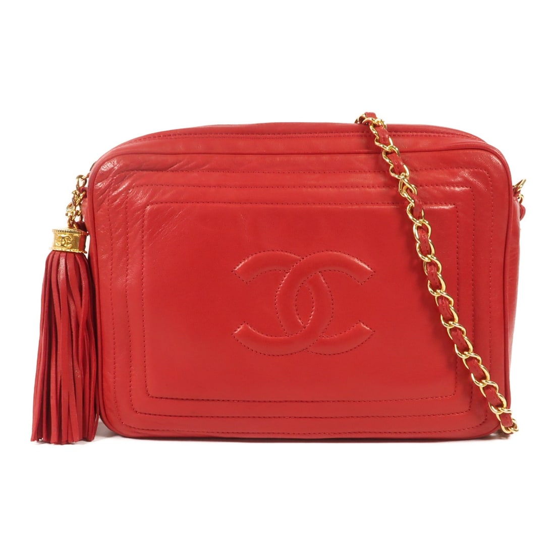 CHANEL Red Lambskin Chain Shoulder Bag with Gold Hardware: CHANEL Red Lambskin Chain Shoulder Bag with Gold Hardware Elevate your style with this stunning CHANEL CC Chain Shoulder Bag. Crafted from luxurious lambskin leather in a vibrant red hue, this bag exu