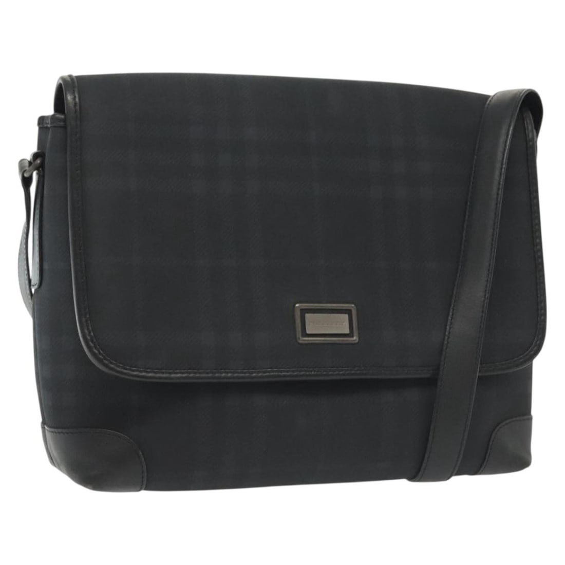 Navy Canvas Shoulder Bag in Burberry Nova Check Pattern: Navy Canvas Shoulder Bag in Burberry Nova Check Pattern This Burberry Nova Check shoulder bag features the iconic navy canvas with the classic Nova check pattern. Designed for unisex use, it offers a 