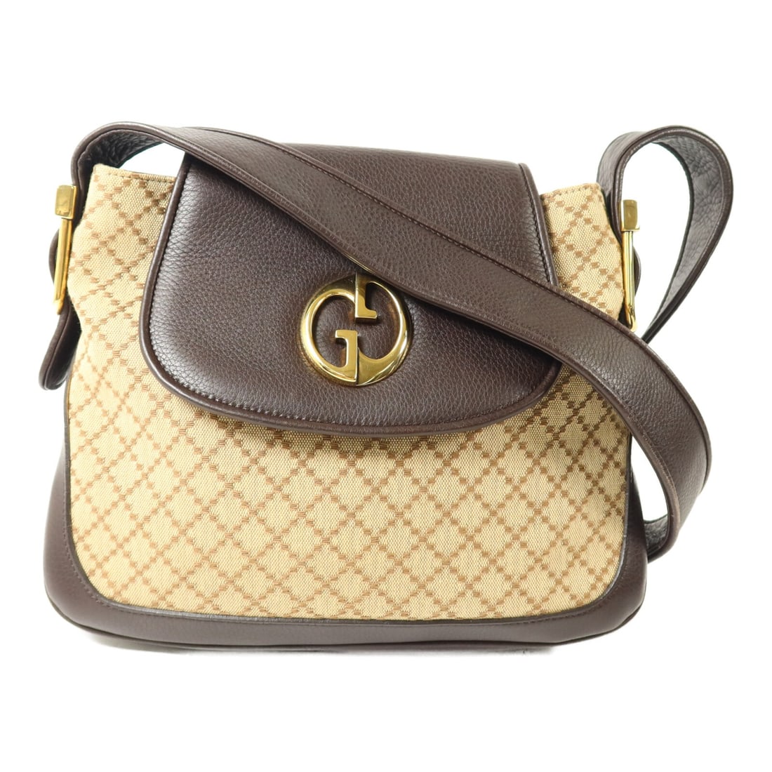Gucci GG Canvas Brown Shoulder Bag: Gucci GG Canvas Brown Shoulder Bag This GUCCI shoulder bag is crafted from brown canvas and features a classic design suitable for everyday use. The bag offers a regular size and is tailored for women