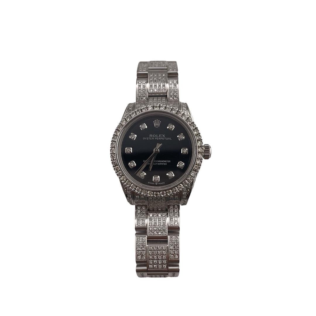 Rolex 177200 Ladies Aftermarket Black Dial Diamond Bezel Oyster Bracelet Watch: Rolex 177200 Ladies Aftermarket Black Dial Diamond Bezel Oyster Bracelet Watch This ladies' Rolex Oyster Perpetual watch features an Aftermarket black dial and a diamond bezel, paired with the classic