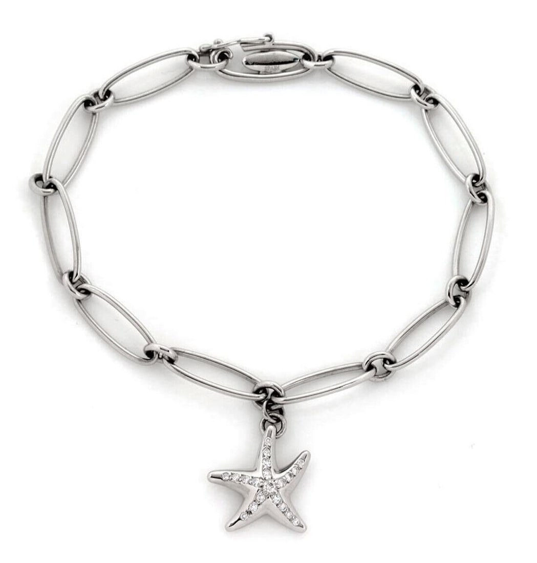 Elsa Peretti Tiffany platinum starfish diamond charm bracelet: Elsa Peretti Tiffany platinum starfish diamond charm bracelet This authentic Tiffany & Co. bracelet from the Elsa Peretti Starfish collection features a polished platinum chain with elongated oval lin