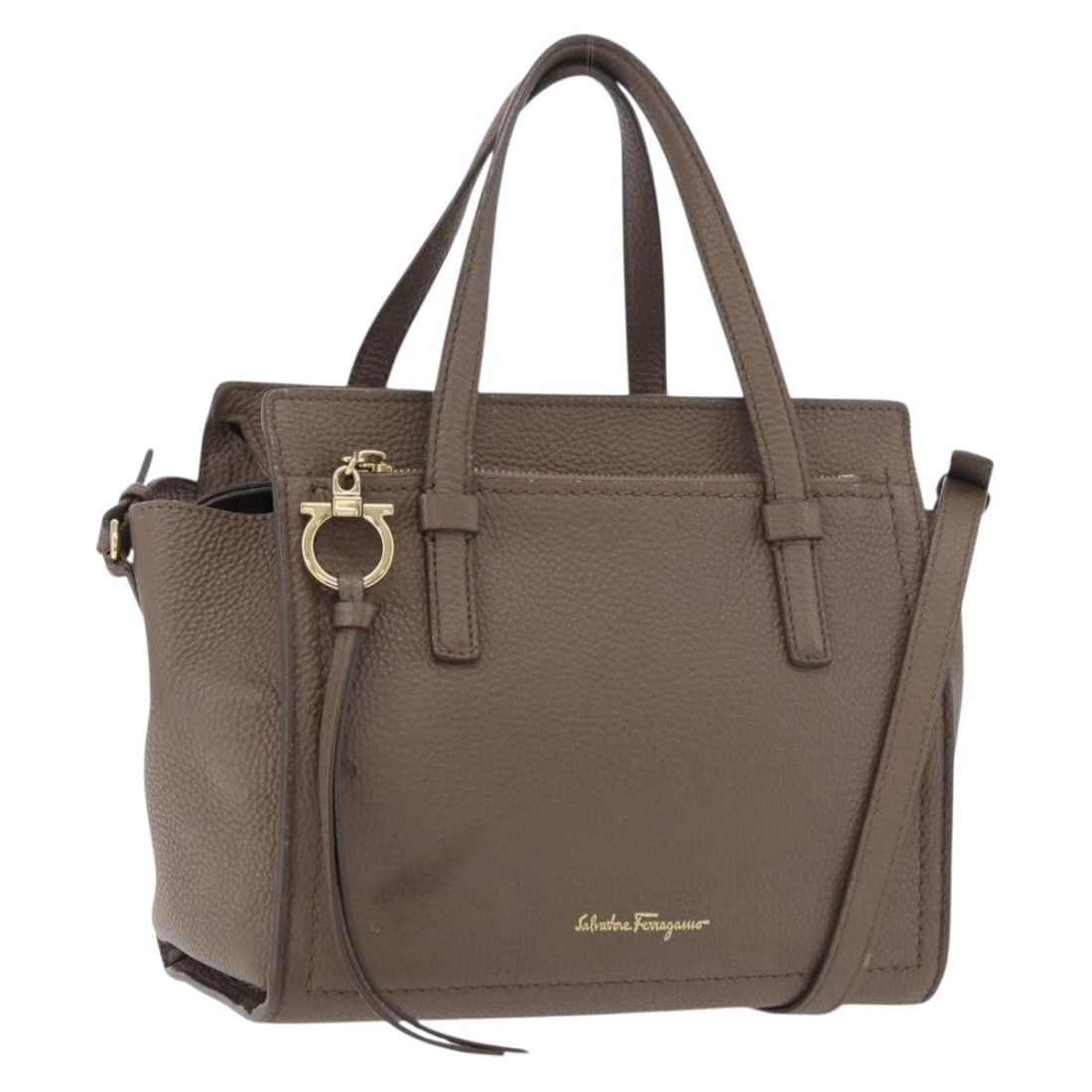 Salvatore Ferragamo Brown Gold Leather Gancini Shoulder Bag with Strap: Salvatore Ferragamo Brown Gold Leather Gancini Shoulder Bag with Strap This Salvatore Ferragamo Gancini handbag is crafted from brown leather with gold-tone accents and offers versatile 2-way carrying