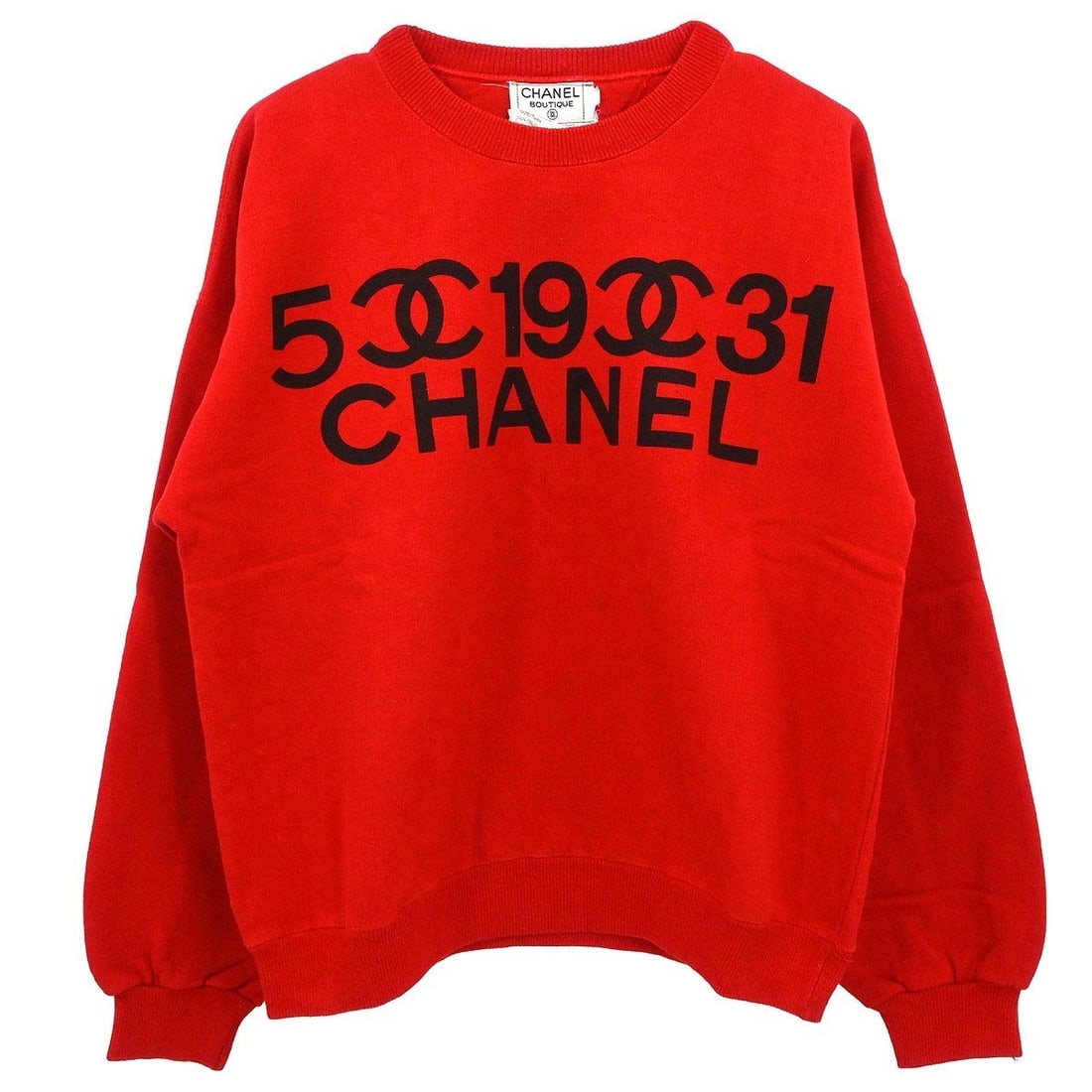 Red Cotton Long Sleeve Top by Chanel Size M: Red Cotton Long Sleeve Top by Chanel Size M This Chanel long sleeve top is crafted from 100% cotton in a vibrant red color. Designed for a regular fit, it is ideal for casual occasions. The top is in 