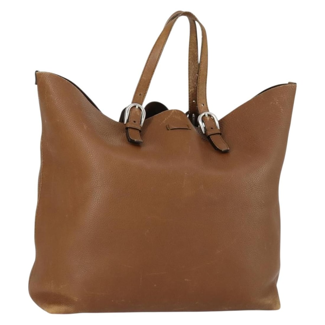 Brown Leather GUCCI Tote with Silver Accents and Adjustable Handles: Brown Leather GUCCI Tote with Silver Accents and Adjustable Handles This GUCCI tote bag features a brown leather exterior with silver accents. Crafted in Italy, the bag offers a spacious interior, mak