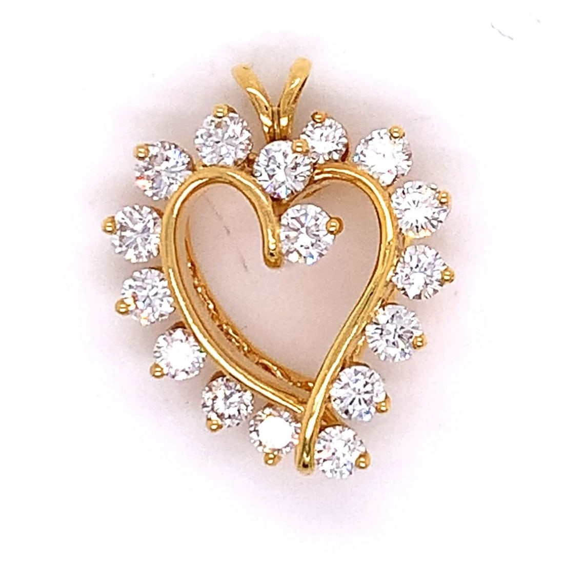 18K Yellow Gold Diamond Heart Pendant 2.25 Ct 16 Diamonds G-H VVS-VS: 18K Yellow Gold Diamond Heart Pendant 2.25 Ct 16 Diamonds G-H VVS-VS This stunning 18K yellow gold heart pendant features a total of 16 diamonds, showcasing a combined weight of approximately 2.25 car