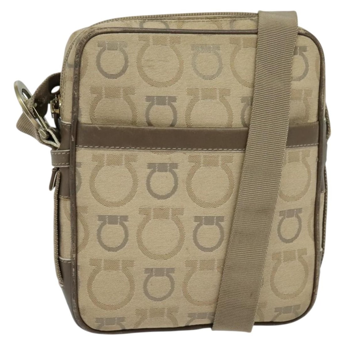 Beige Canvas Shoulder Bag by Salvatore Ferragamo for Women: Beige Canvas Shoulder Bag by Salvatore Ferragamo for Women This Salvatore Ferragamo shoulder bag features a beige canvas exterior and is designed for women. The bag is made in Italy and offers a compa