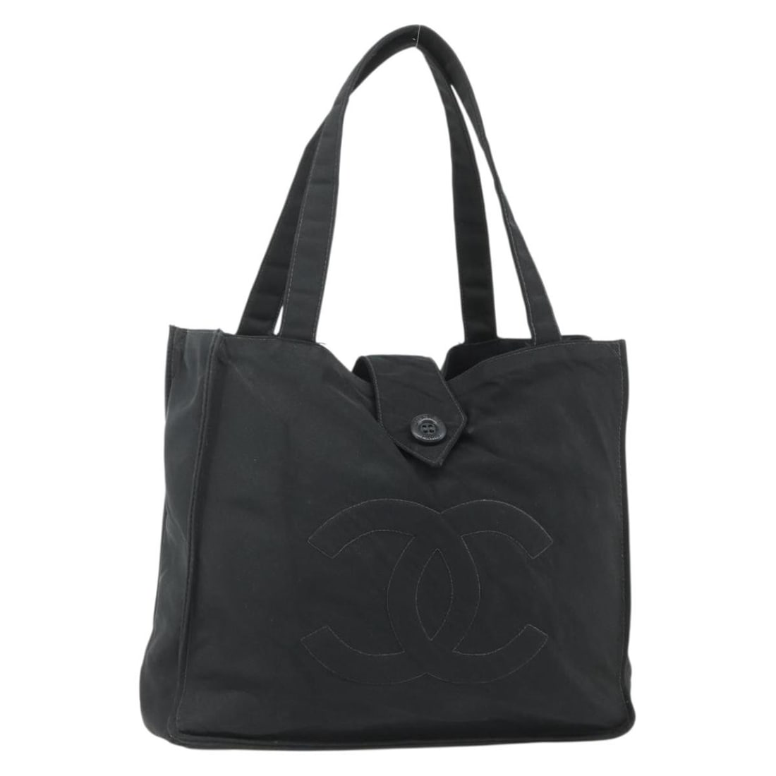 CHANEL Black Nylon Handbag Silver Tone CC France: CHANEL Black Nylon Handbag Silver Tone CC France This CHANEL handbag is crafted from durable black nylon with silver-tone accents, featuring the iconic CC logo. Designed for women, it offers a practic