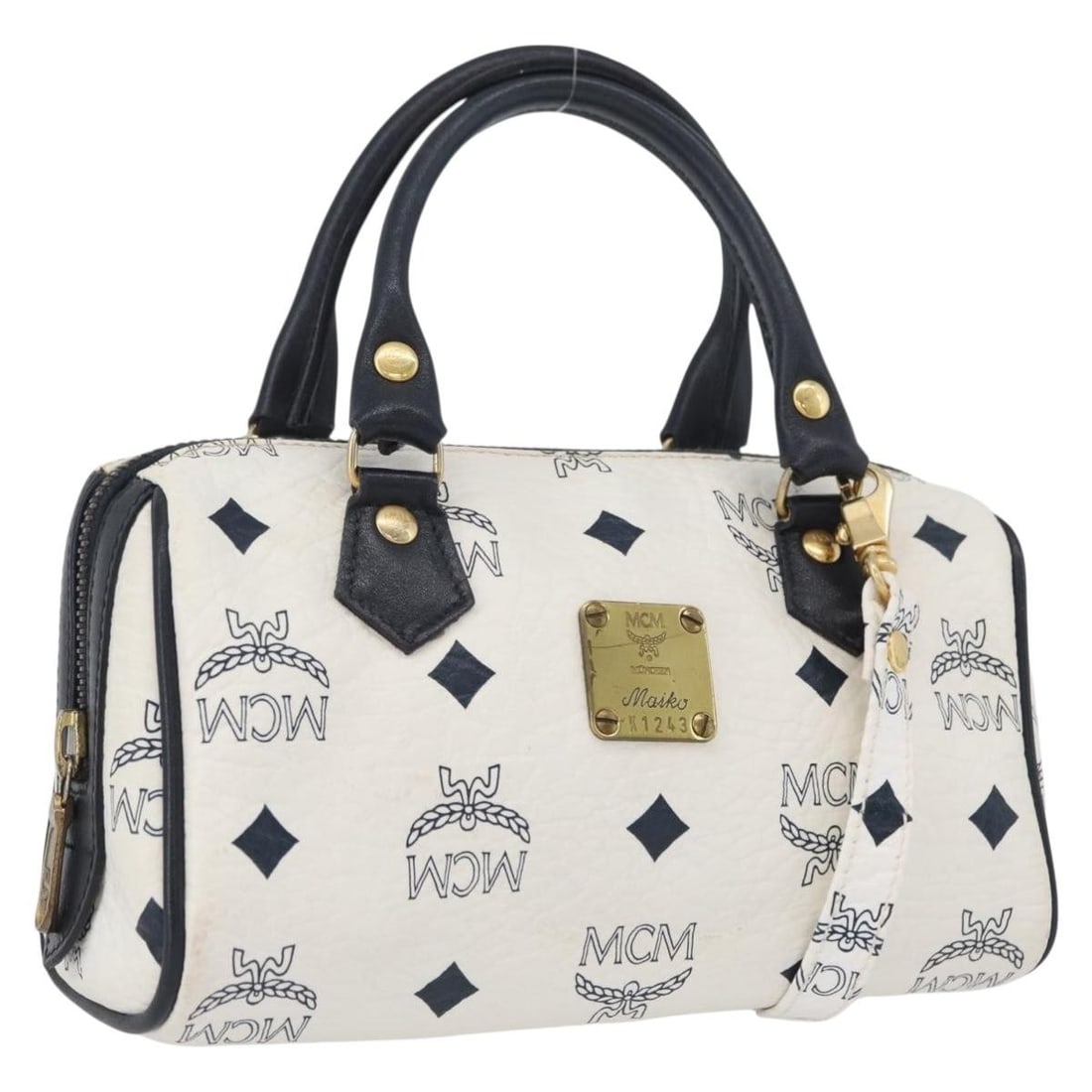 MCM White Gold PVC Leather Two Way Handbag with Shoulder Strap: MCM White Gold PVC Leather Two Way Handbag with Shoulder Strap This MCM Vicetos Logogram 2-way handbag features a white and gold PVC leather exterior. Designed for women, it can be carried by hand or 