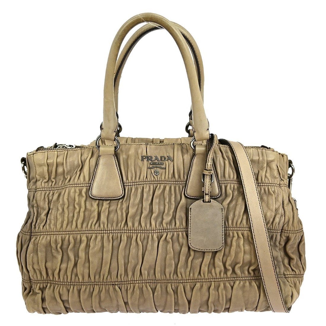 Prada Beige Leather Two Way Shoulder Bag 14 Inch: Prada Beige Leather Two Way Shoulder Bag 14 Inch This Prada shoulder handbag features a beige leather exterior with matching leather handles and strap, accented by the iconic Prada logo. Designed for 