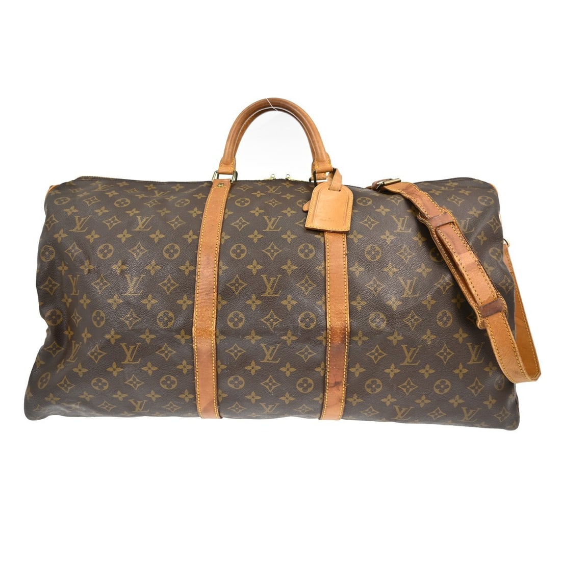 Louis Vuitton Keepall Bandouliere 60 Monogram Duffle Bag: Louis Vuitton Keepall Bandouliere 60 Monogram Duffle Bag This is a vintage Louis Vuitton Keepall Bandouliere 60 duffle bag crafted from monogram canvas leather in brown. Designed for travel, this extr