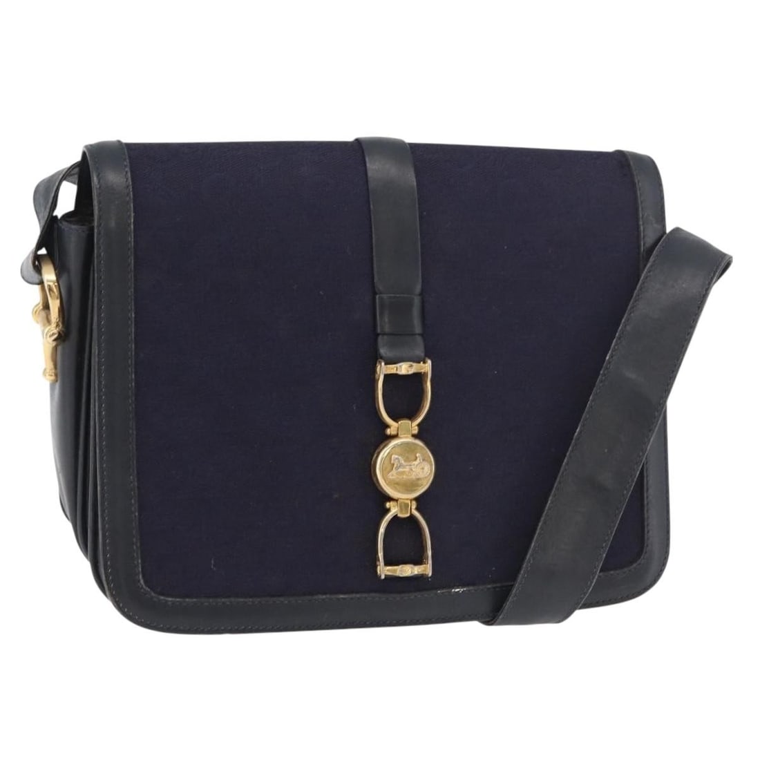 CELINE Navy Gold Canvas Sulky Shoulder Bag: CELINE Navy Gold Canvas Sulky Shoulder Bag This CELINE C Sulky Horse Carriage shoulder bag is crafted from navy and gold canvas and features a classic silhouette. Designed for women, it offers a pract