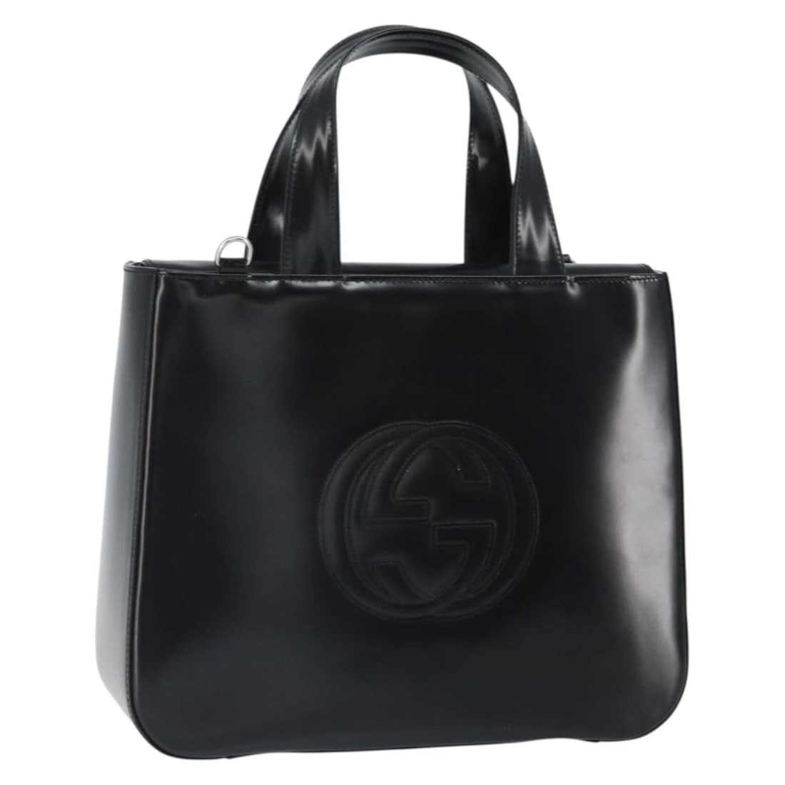 Black Patent Leather Gucci Tote 000 1013 0504 Silver Accents: Black Patent Leather Gucci Tote 000 1013 0504 Silver Accents This Gucci tote bag is crafted from black patent leather with silver-tone accents. Made in Italy, it features dual handles and a spacious i