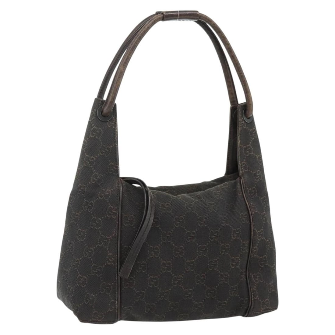 Gucci GG Canvas Dark Brown Handbag 101333 Italy: Gucci GG Canvas Dark Brown Handbag 101333 Italy This Gucci GG Canvas hand bag features a dark brown exterior and is crafted from the brand's signature GG canvas material. Designed for women, the bag o
