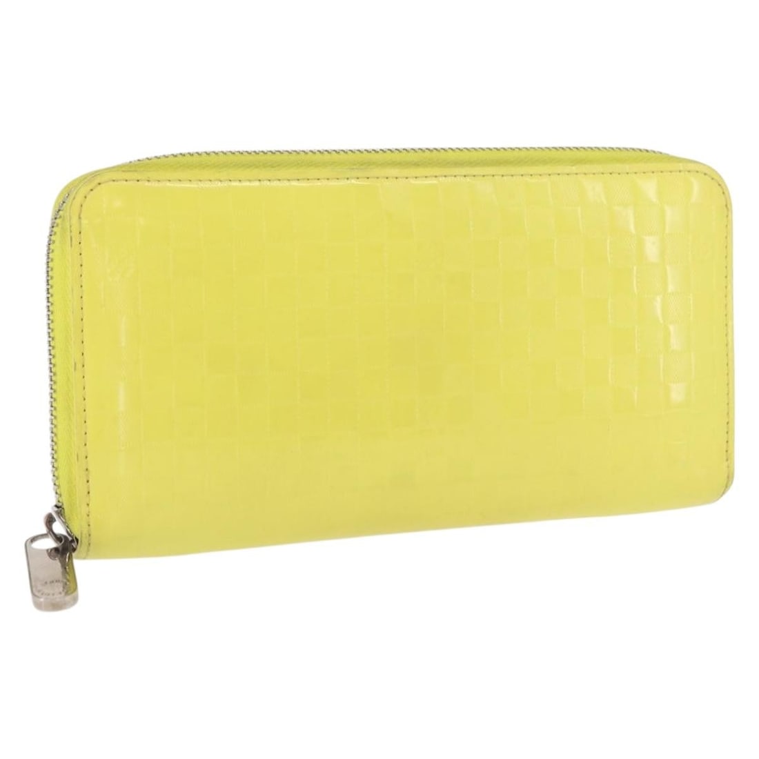 Yellow Damier Facet Zippy Long Wallet by Louis Vuitton M94401: Yellow Damier Facet Zippy Long Wallet by Louis Vuitton M94401 This is a Louis Vuitton Damier Facet Zippy Long Wallet in yellow monogram canvas. The wallet features a zip-around closure and offers a sp