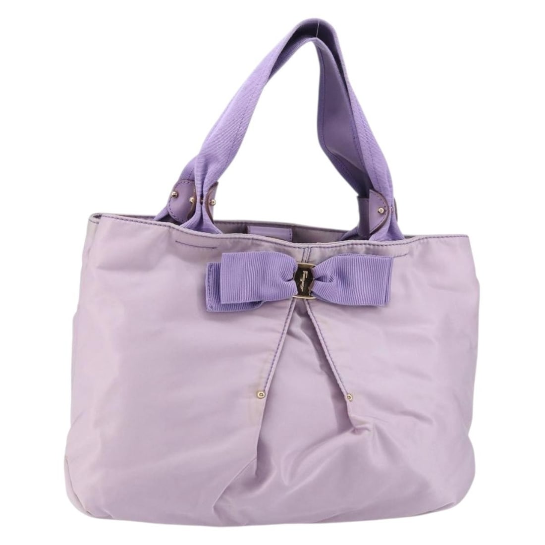 Salvatore Ferragamo Vala Purple Nylon Handbag Gold Tone Accents Italy: Salvatore Ferragamo Vala Purple Nylon Handbag Gold Tone Accents Italy This Salvatore Ferragamo Vala handbag is crafted from purple nylon with gold-tone accents. Made in Italy, it features a spacious m