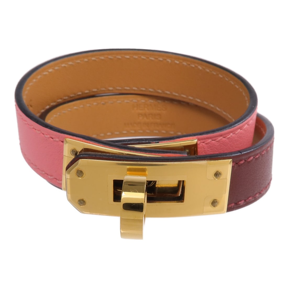 Hermes Kelly Double Tour Swift Leather Pink Bracelet GHW: Hermes Kelly Double Tour Swift Leather Pink Bracelet GHW This Hermes Kelly Double Tour bracelet features Swift leather in a combination of Rouge H and Rose Confetti pink tones. Crafted from calfskin, 