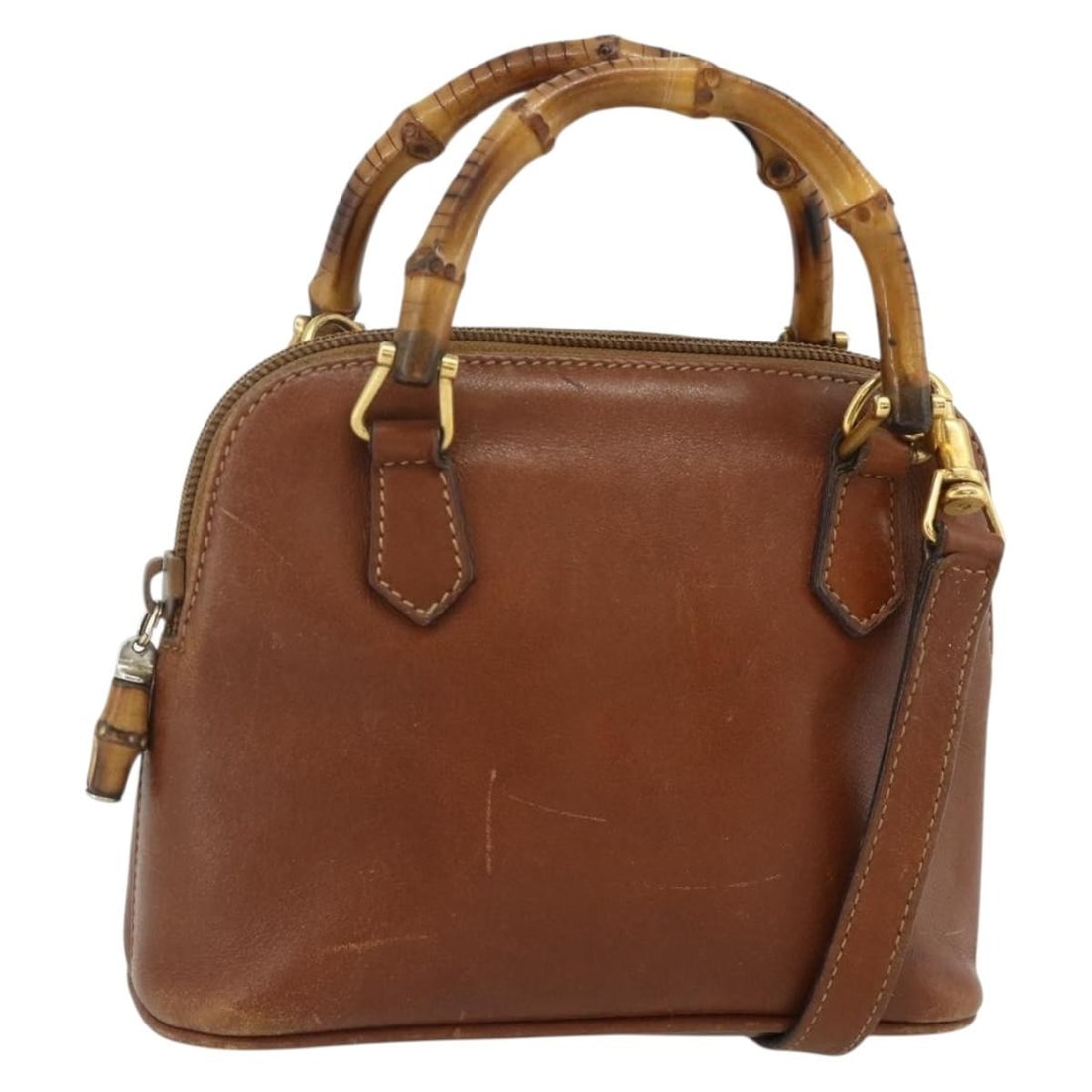 Gucci Bamboo leather shoulder bag brown gold with strap: Gucci Bamboo leather shoulder bag brown gold with strap This GUCCI Bamboo Hand Bag is crafted from brown and gold leather and features a versatile 2-way design with both a top handle and a detachable 
