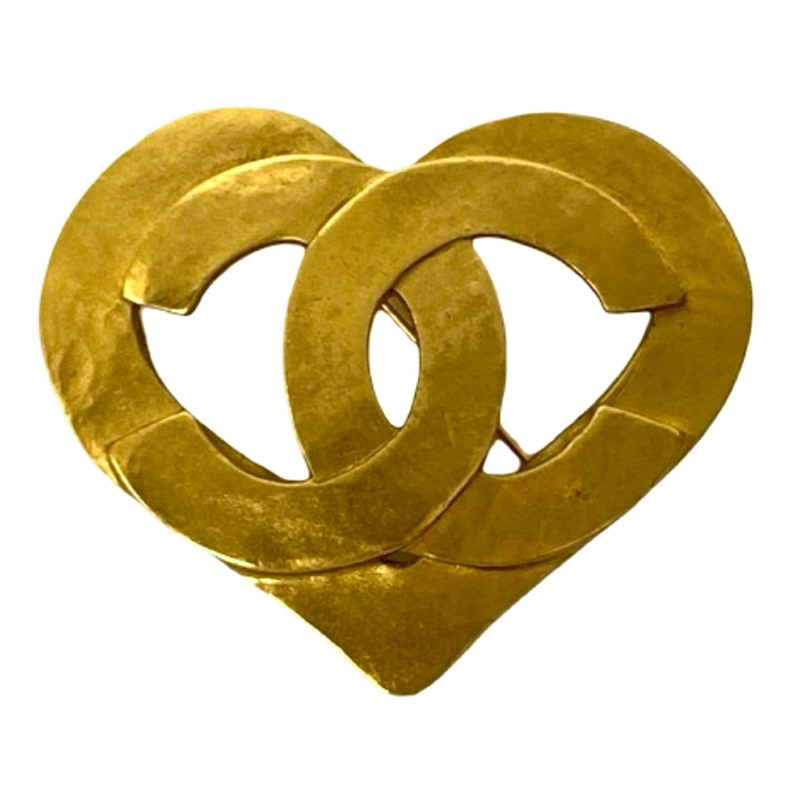 Chanel Heart Shaped Gold Tone Metal Brooch with CC Logo: Chanel Heart Shaped Gold Tone Metal Brooch with CC Logo This Chanel CC Heart Brooch showcases a gold plated metal body with a heart-shaped design and a back pin closure. Made in France, this brooch fe