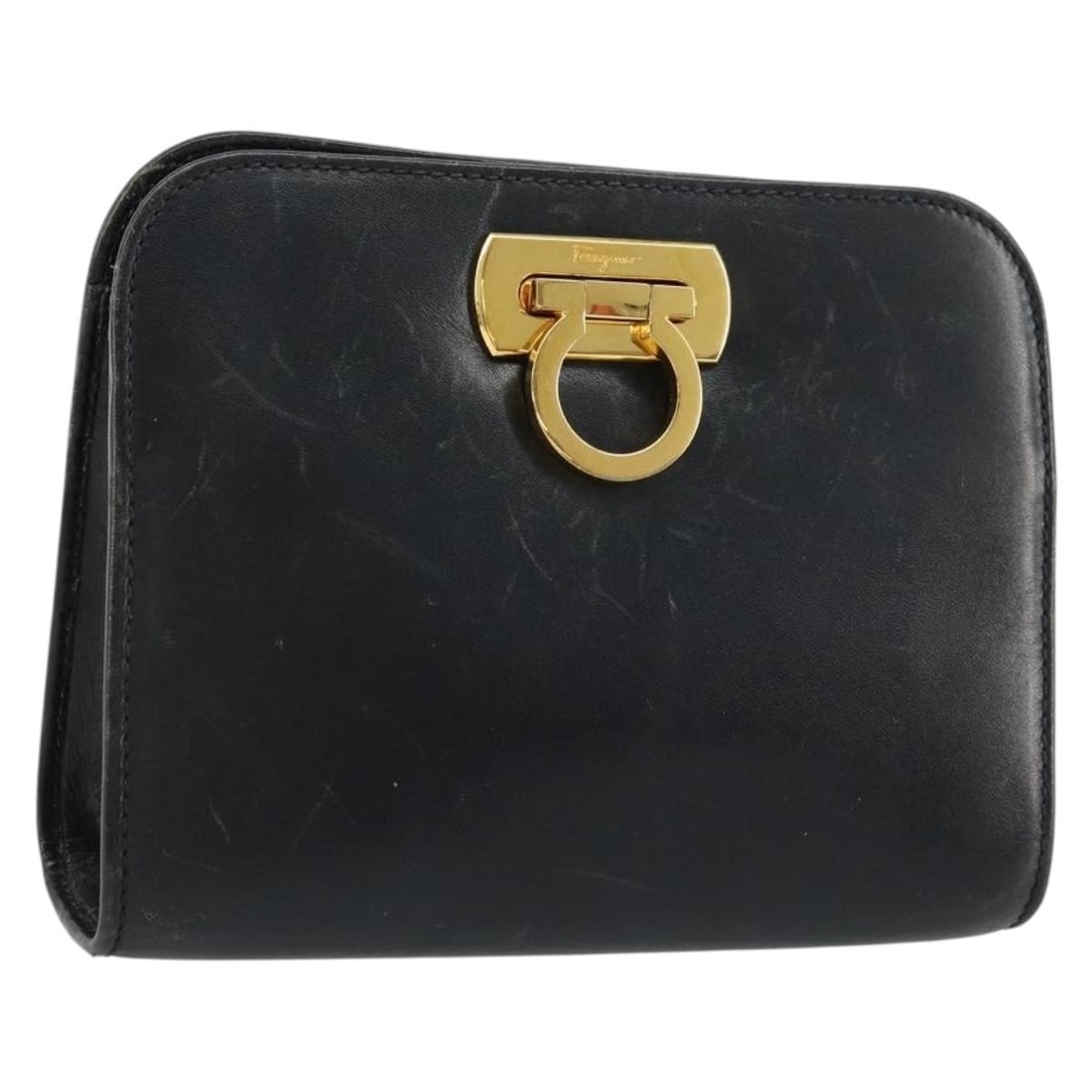 Salvatore Ferragamo Gancini navy leather shoulder bag: Salvatore Ferragamo Gancini navy leather shoulder bag This Salvatore Ferragamo Gancini shoulder bag is crafted from navy leather with gold-tone accents. The compact design features an approximate widt