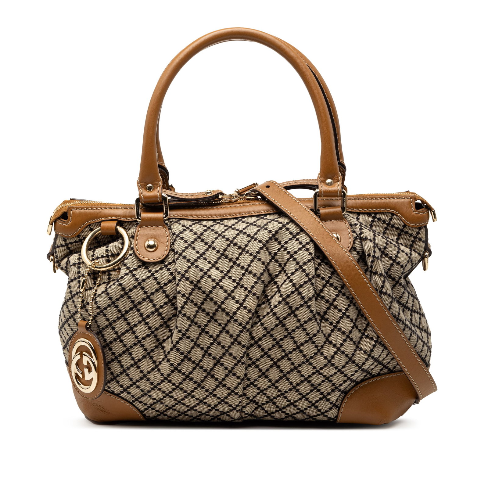 Gucci Sukey Beige Diamante Canvas Satchel with Leather Trim and Shoulder Strap: Gucci Sukey Beige Diamante Canvas Satchel with Leather Trim and Shoulder Strap The Gucci Diamante Canvas Sukey Satchel features a beige canvas body with leather trim, rolled leather handles, and a det