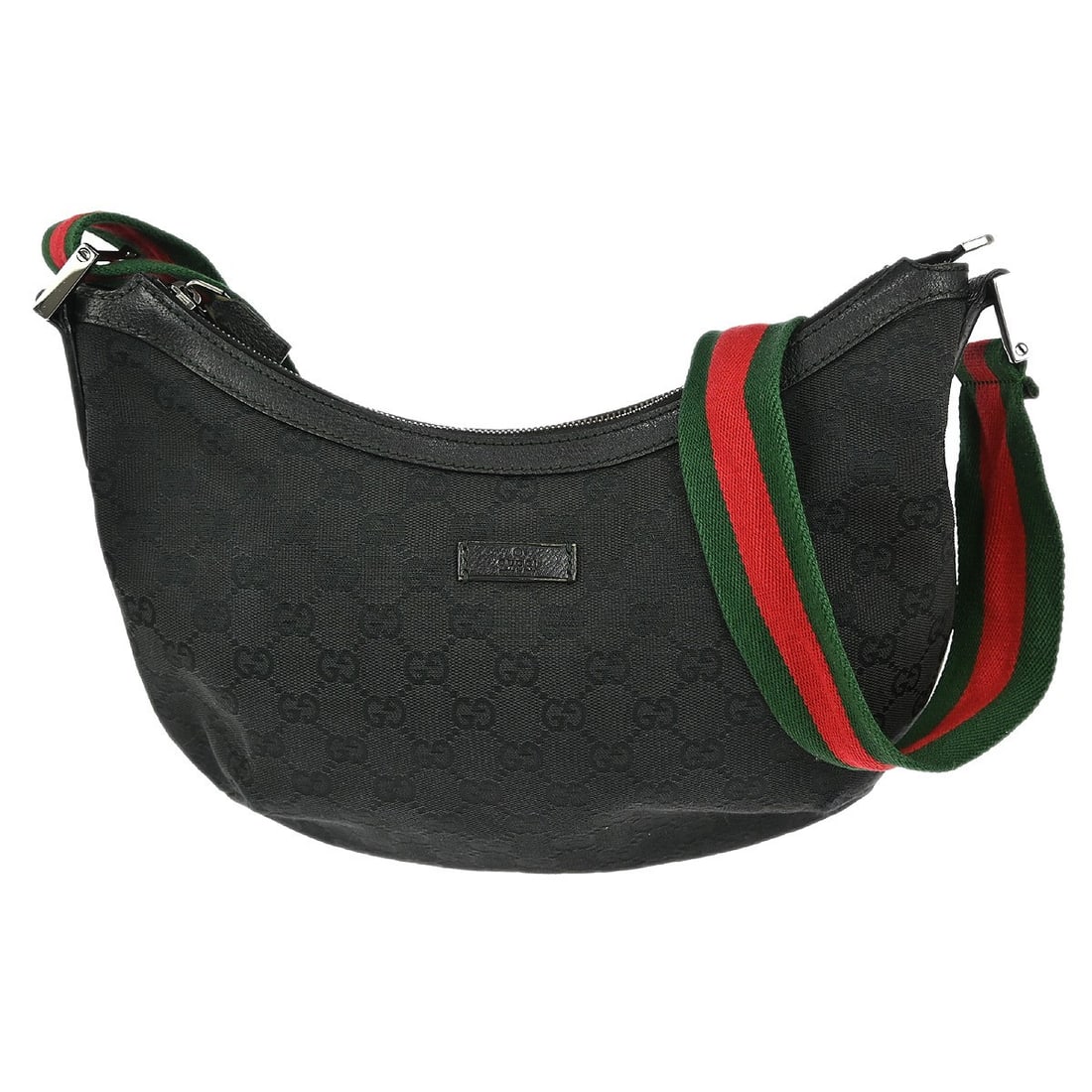 Gucci GG Black Canvas Leather Shoulder Bag Vintage Medium: Gucci GG Black Canvas Leather Shoulder Bag Vintage Medium This vintage Gucci shoulder bag features the iconic GG pattern in black canvas leather. Designed for women, it offers a medium size with a cla
