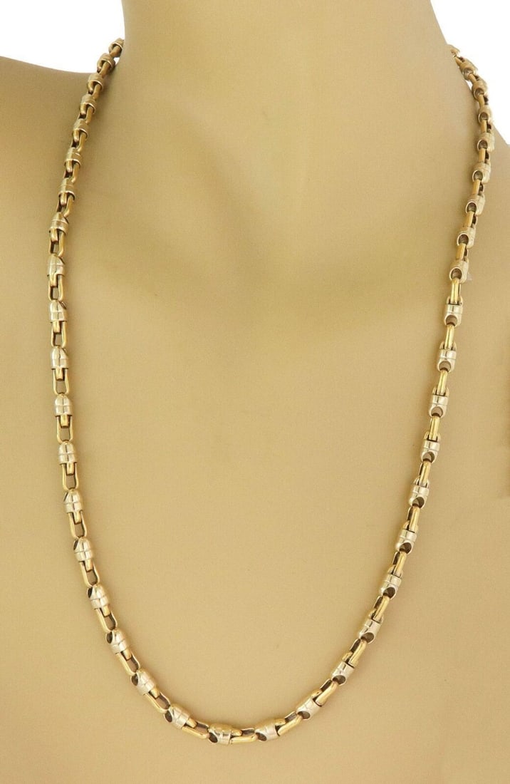 18k Two Tone Gold Barrel Link Necklace 23.5 inch: 18k Two Tone Gold Barrel Link Necklace 23.5 inch This vintage and antique barrel link necklace is crafted from 18k yellow and white gold in a multi-tone design. Measuring 23.5 inches in length, it fea