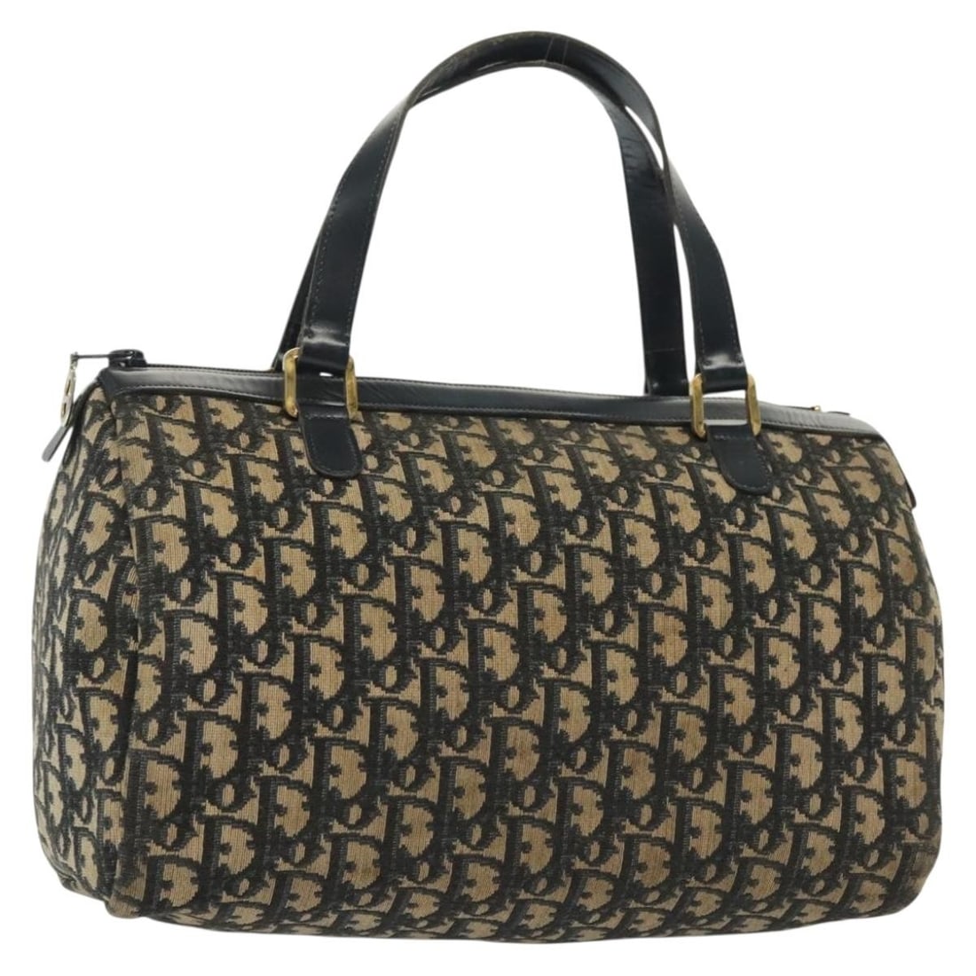 Dior Trotter Boston Handbag Navy Canvas Vintage Diorissimo Collection: Dior Trotter Boston Handbag Navy Canvas Vintage Diorissimo Collection This Christian Dior vintage Trotter Boston bag features the iconic Diorissimo canvas in navy, designed for women. The bag shows si