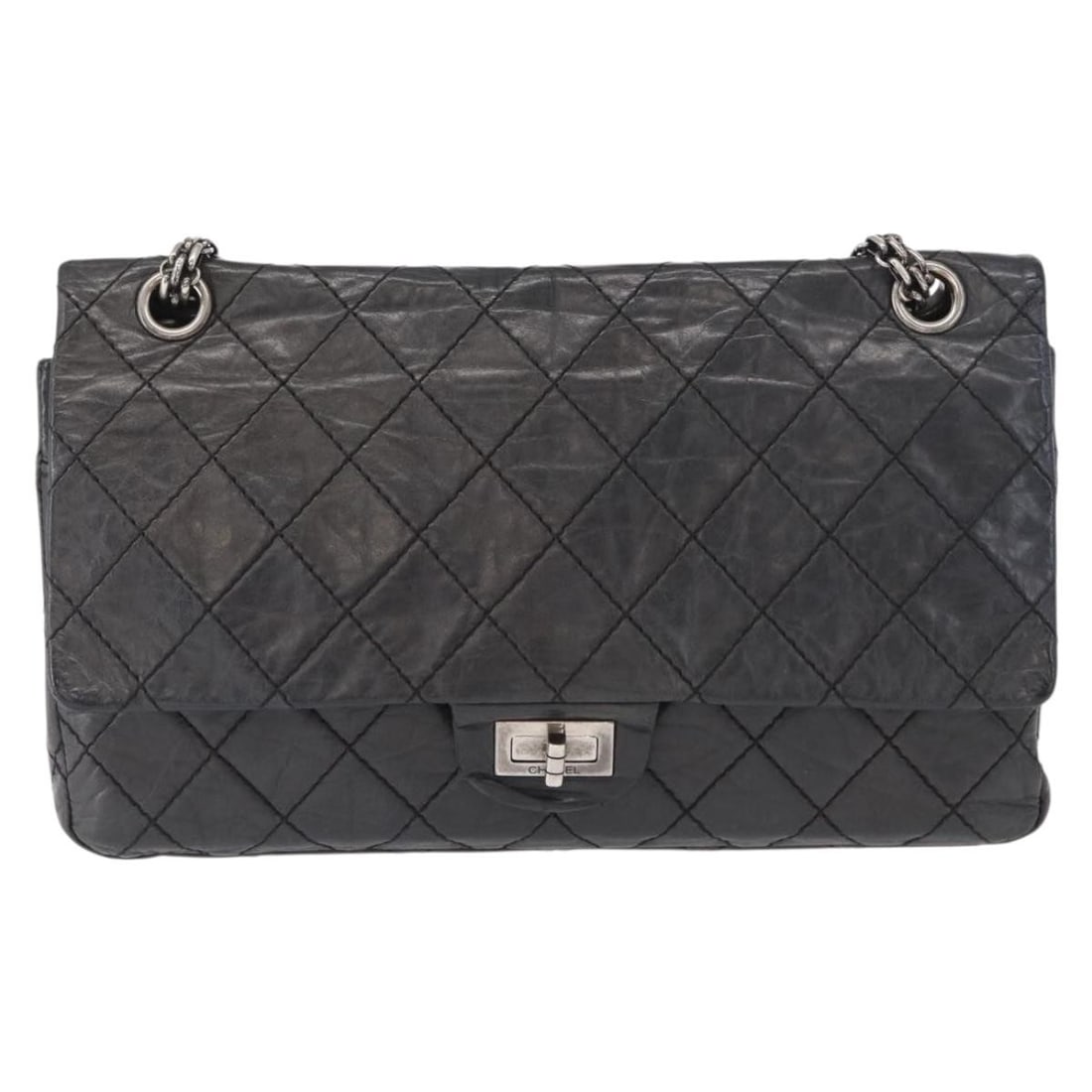 Black Chanel Reissue 2.55 Quilted Leather Shoulder Flap Bag: Black Chanel Reissue 2.55 Quilted Leather Shoulder Flap Bag The Chanel Reissue 2.55 Flap Bag is crafted from quilted aged calfskin leather in black, designed for women. This classic piece features a f