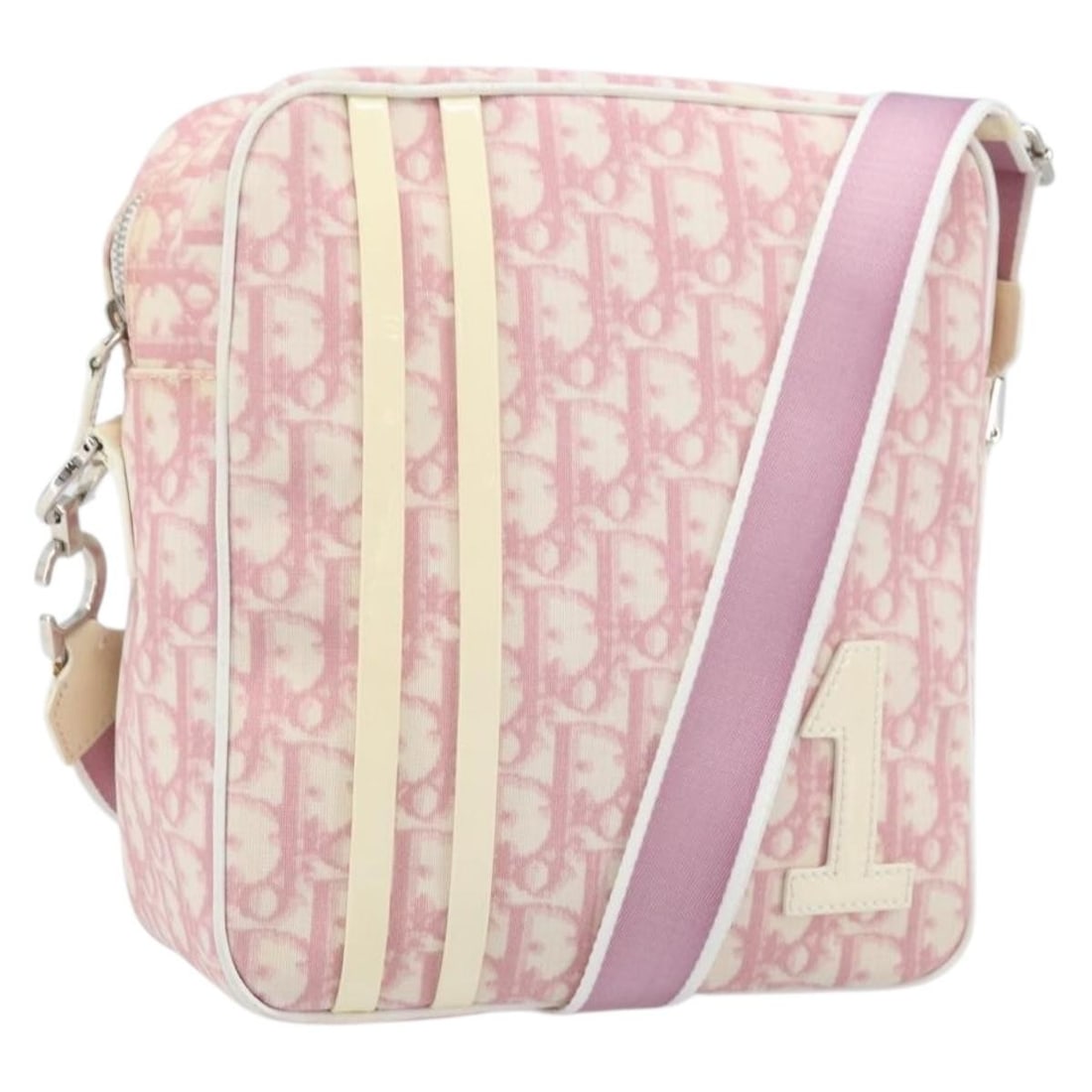 Christian Dior Pink Trotter PVC Canvas Shoulder Bag with Silver Accents: Christian Dior Pink Trotter PVC Canvas Shoulder Bag with Silver Accents This Christian Dior Trotter Canvas Shoulder Bag features pink and silver PVC leather with the iconic Trotter canvas design. It i