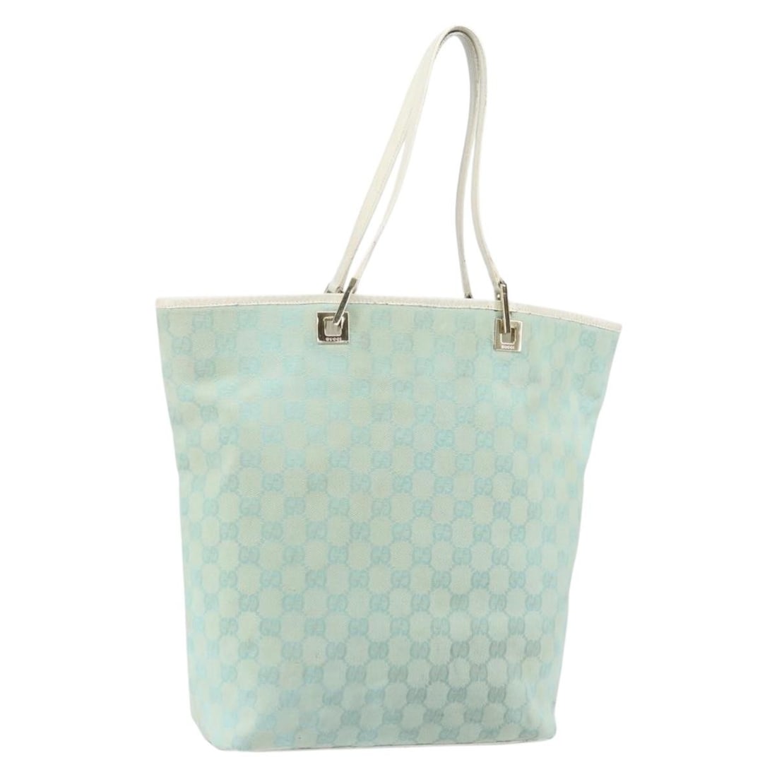 Peppermint and Gold Canvas Tote by Gucci Model 002 1098 3444: Peppermint and Gold Canvas Tote by Gucci Model 002 1098 3444 This Gucci GG Canvas tote bag features a peppermint and gold color scheme with canvas material and GG canvas detailing. The bag is made in 