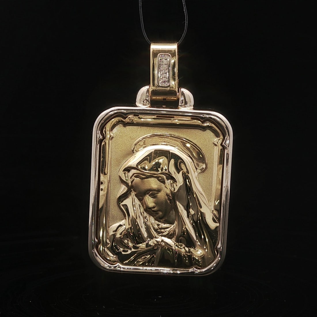 Large 18k Yellow Gold Repousse Virgin Mary Pendant Italian Design: Large 18k Yellow Gold Repousse Virgin Mary Pendant Italian Design This large pendant features a detailed repousse depiction of the Virgin Mother Mary, crafted in 18K solid yellow gold. The piece displ