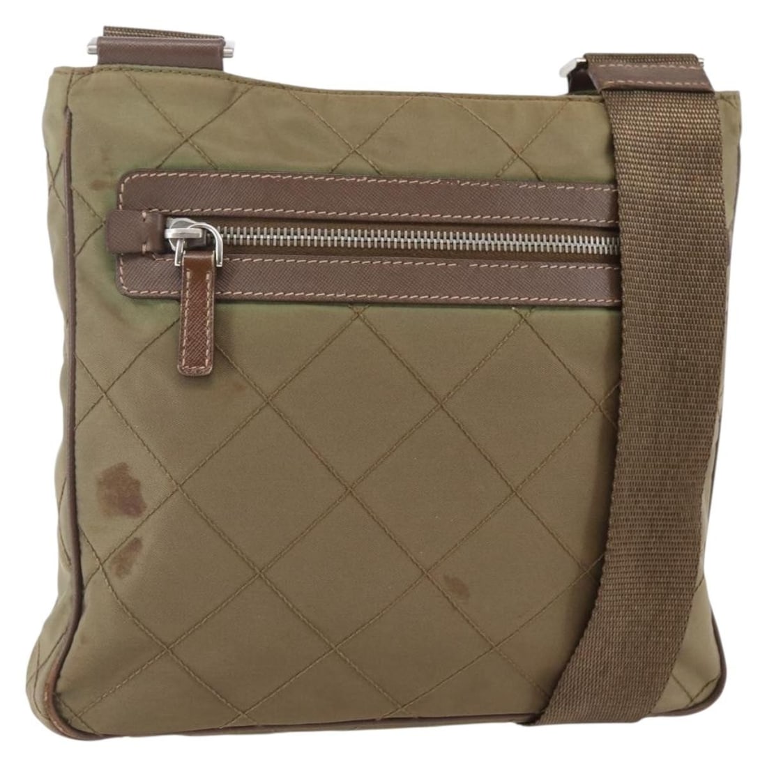 Prada khaki nylon women s shoulder bag silver Italy: Prada khaki nylon women s shoulder bag silver Italy This PRADA shoulder bag is crafted from durable nylon in a khaki and silver color scheme. Designed for women, it features a spacious main compartmen