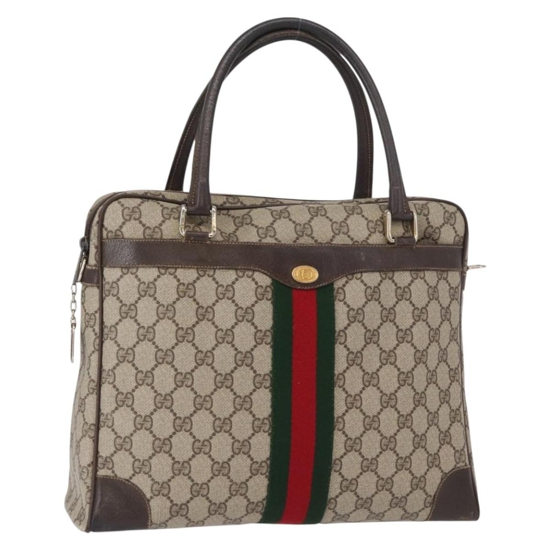 Beige GG Supreme Sherry Web PVC Handbag by Gucci with Dust Bag: Beige GG Supreme Sherry Web PVC Handbag by Gucci with Dust Bag This is a Gucci GG Supreme Web Sherry Line handbag crafted from beige and gold PVC leather with GG canvas accents. The bag features a spa