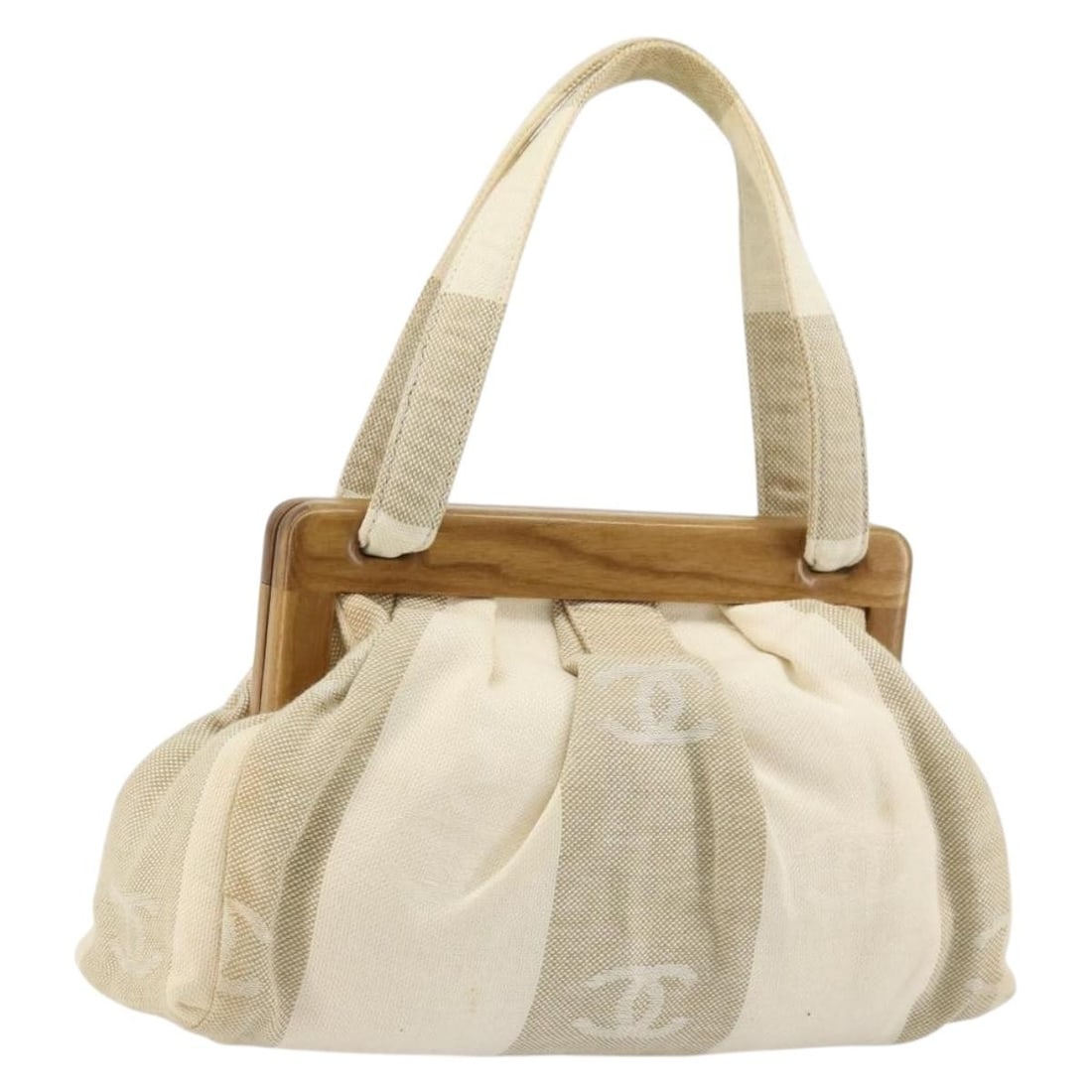 Beige Chanel canvas handbag with card and manual: Beige Chanel canvas handbag with card and manual This CHANEL handbag is crafted from beige canvas and features the iconic CC logo. Designed for women, it offers a classic silhouette with a handle drop