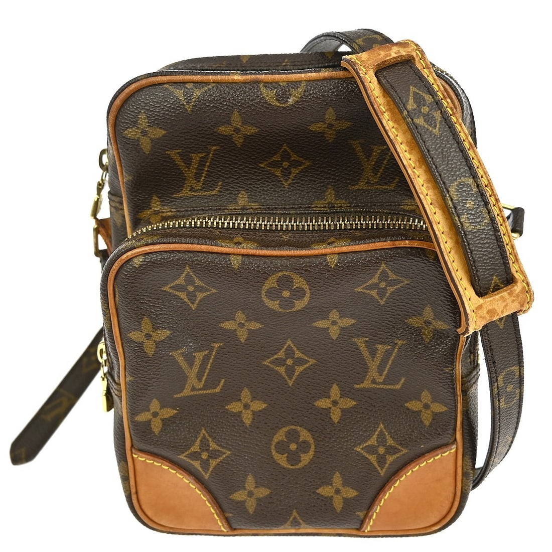 Louis Vuitton Amazon Monogram Crossbody Bag: Louis Vuitton Amazon Monogram Crossbody Bag This vintage Louis Vuitton Amazone crossbody bag features the signature Monogram canvas leather exterior in brown, complemented by a brown canvas leather cr