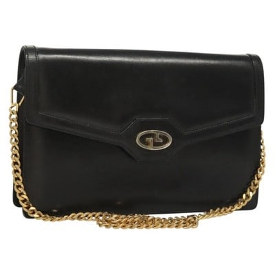 GUCCI Black Leather Shoulder Bag Gold Accent Italy: GUCCI Black Leather Shoulder Bag Gold Accent Italy This GUCCI chain shoulder bag features a classic black leather exterior with gold-tone accents. Designed with a compact silhouette, it offers both st