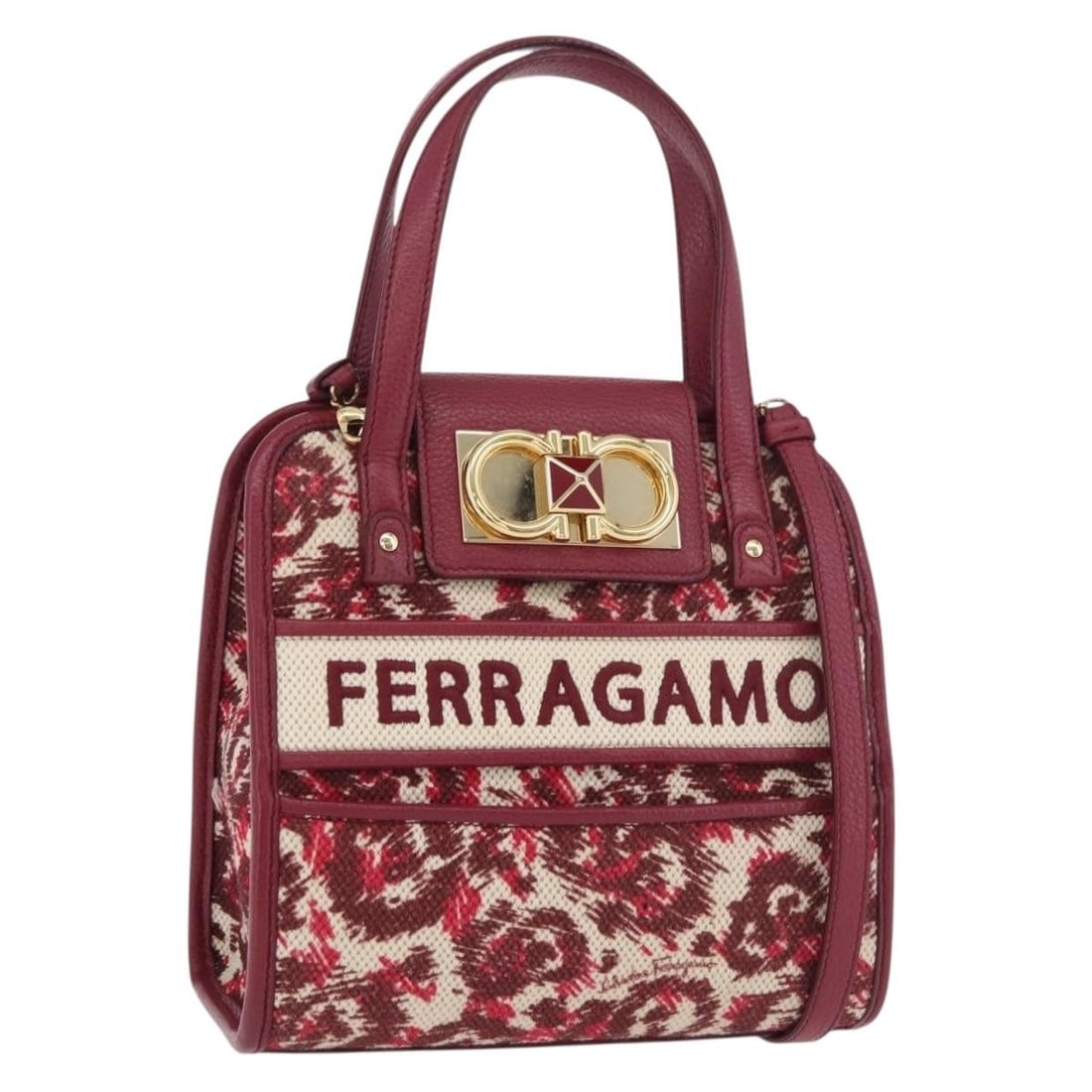 Salvatore Ferragamo Gancini Red Canvas 2way Hand Bag Shoulder Strap: Salvatore Ferragamo Gancini Red Canvas 2way Hand Bag Shoulder Strap This Salvatore Ferragamo Gancini handbag features a versatile 2-way design crafted from red and gold canvas. Made in Italy, it is de