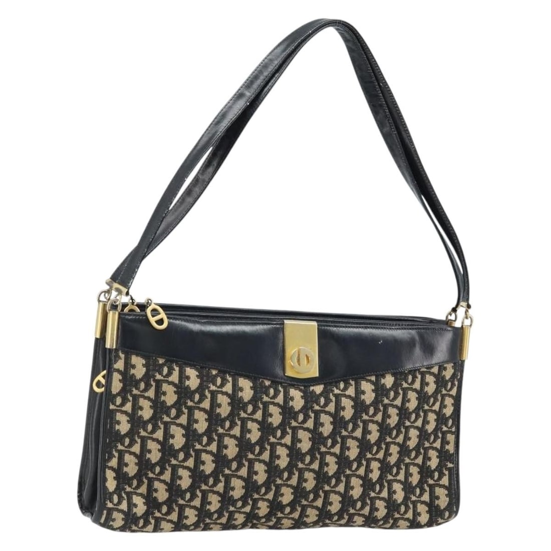Christian Dior Navy Trotter Canvas Shoulder Purse Gold Accents France: Christian Dior Navy Trotter Canvas Shoulder Purse Gold Accents France This Christian Dior Trotter Canvas shoulder bag features a navy and gold color scheme and is crafted from signature Trotter canvas