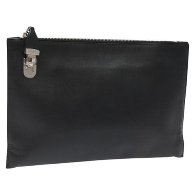 Prada Saffiano Leather Black Silver Clutch Bag: Prada Saffiano Leather Black Silver Clutch Bag This Prada clutch bag is crafted from black Saffiano leather with silver-tone accents. The bag features a structured silhouette and is made in Italy. Ple
