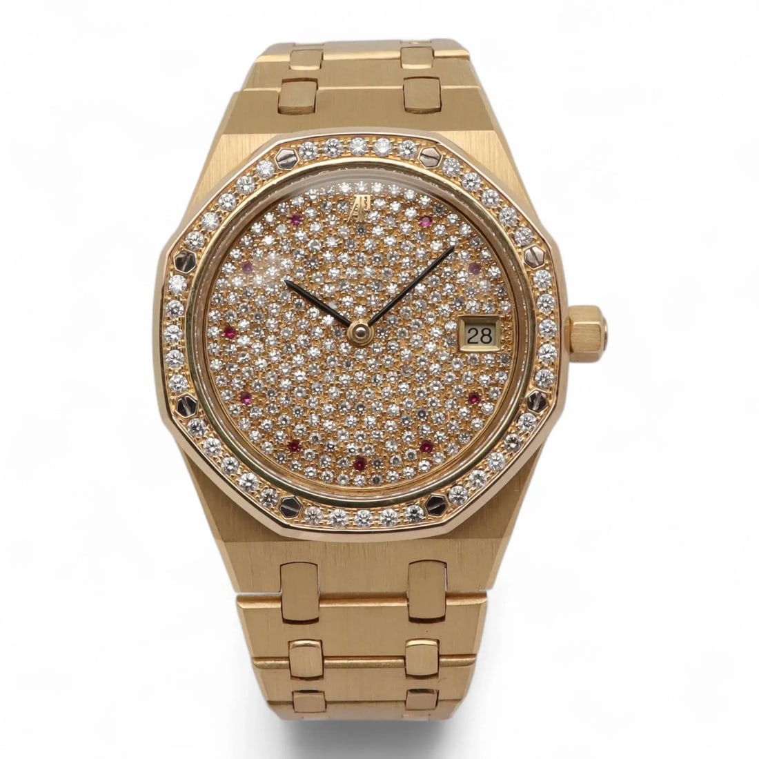 Royal Oak 36mm Yellow Gold Watch With Diamond Ruby Dial Model 14813BA: Royal Oak 36mm Yellow Gold Watch With Diamond Ruby Dial Model 14813BA This Audemars Piguet Royal Oak wristwatch features a 36mm octagonal case crafted from yellow gold, complemented by a matching yell