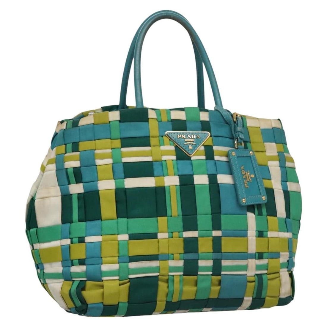 Prada green nylon women s handbag Italy 11 inch: Prada green nylon women s handbag Italy 11 inch This PRADA hand bag is crafted from green nylon and designed for women. Made in Italy, it features a spacious interior and a practical handle drop for c