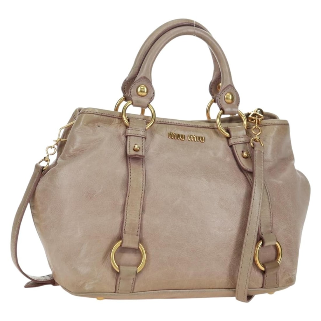 Miu Miu Pink Gold Leather 2way Hand Bag with Dust Bag Strap: Miu Miu Pink Gold Leather 2way Hand Bag with Dust Bag Strap This Miu Miu 2-way handbag is crafted from leather in a pink and gold color combination. Designed for women, it features both top handles an