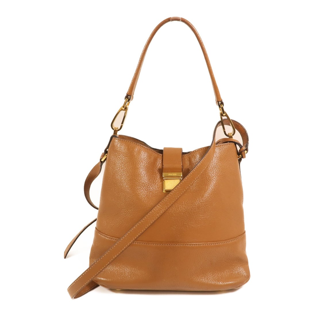 Brown Calfskin 2 Way Shoulder Bag by Miu Miu with Gold Hardware: Brown Calfskin 2 Way Shoulder Bag by Miu Miu with Gold Hardware This Miu Miu 2-way shoulder bag is crafted from brown calfskin leather and features gold tone hardware. Designed for women, it offers ve