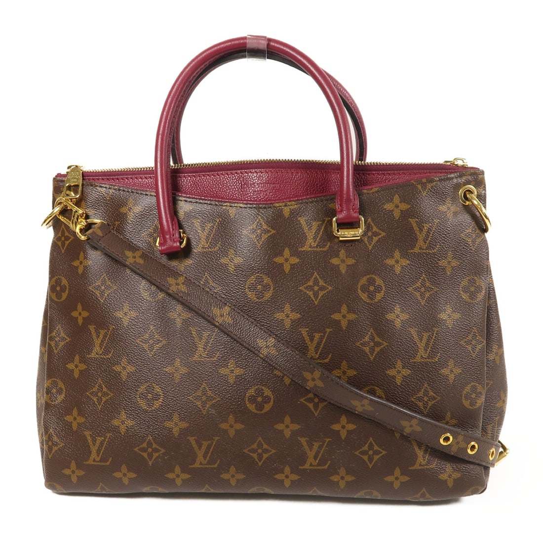 Louis Vuitton Pallas Monogram Brown Purple 2 Way Shoulder Bag GHW: Louis Vuitton Pallas Monogram Brown Purple 2 Way Shoulder Bag GHW This Louis Vuitton Pallas 2-way shoulder bag features the iconic Monogram canvas in brown with purple accents and gold-tone hardware. 