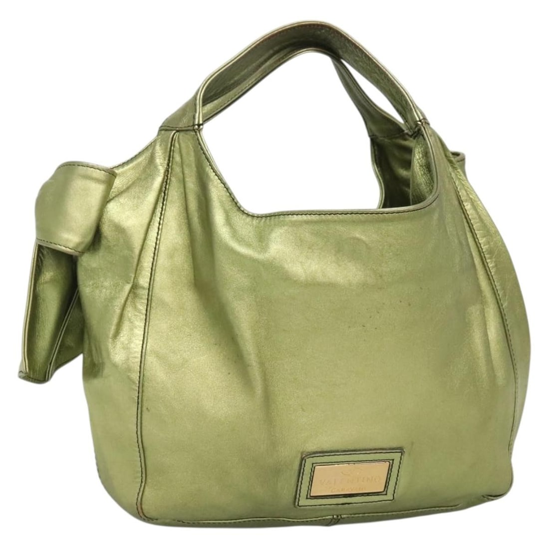 Valentino Lime Green Leather Hand Bag Gold Accents Made in Italy: Valentino Lime Green Leather Hand Bag Gold Accents Made in Italy This VALENTINO hand bag is a stunning blend of lime green and gold leather, crafted with care in Italy. It features a spacious interior